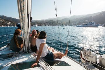 Group sailing on small boat